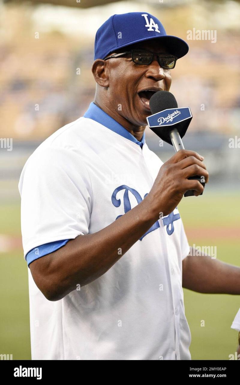 Former Los Angeles Rams running back and Pro Football Hall of Famer Eric  Dickerson talks to the crowd prior to a baseball game between the Los  Angeles Dodgers and the San Diego